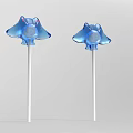 Two Blue Manta Ray Shaped Shiny Lollipops On White Sticks