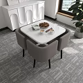 Modern White Square Table With Gray Chairs Set In Lounge Area Featuring Cookies Coffee Cups