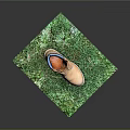Brown Leather Work Boot With Dark Collar And Lace Up Design On Green Grass Platform