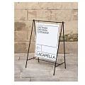 Billboard Showing Lacapella Entrance with English Spanish Signs and Arrow
