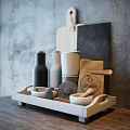 Essential Kitchenware Collection With Wooden Cutting Board Black Slate Bottles Cups And Bowls