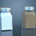 Transparent Glass Salt And Pepper Shakers With Silver Lids And Reflections On Dark Background