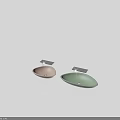 Two Oval Shaped Pastel Pink And Mint Green Washbasins With Metal Stands And Countertops