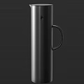 Sleek Black Cylindrical Electric Appliance With Handle For Daily Household Use
