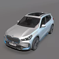 Modern Silver BMW SUV With Black Roof And Blue Accents Exterior Design