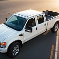 White Double Cab Pickup Truck Exterior On Road In Sunlight Aerial View