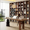 Cozy Study Room Interior With Wooden Desk Open Laptop Table Lamp And Tall Bookshelves