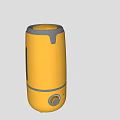 Yellow Humidifiers in Two Different Sizes with Modern Portable Design as Daily Use Electrical Appliances