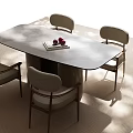 Modern Oval Dining Table with Stone Top and Four Upholstered Chairs Featuring Fruit and Book