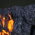 Volcanic Rock Formations With Flowing Lava In Red Orange Colors And Various Sizes