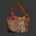 Stylish Orange Handbag With Floral Embroidery And Decorative Knot Handles For Everyday Use