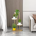 Gold Metal Multi Tier Plant Stand With Green Indoor Plants For Living Room