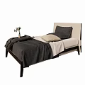 Minimalist Single Bed with Upholstered Headboard Gray Blanket White Sheets and Decorative Pillows