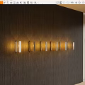 Modern Wall Lamps With Metal Frames Emitting Warm Light On Wooden Wall
