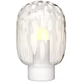 Modern Glass Table Lamp With White Patterns And Warm Yellow Illumination