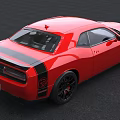 Red Muscle Car With Sleek Exterior Design And Black Alloy Wheels