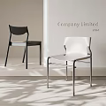 Modern Black And White Dining Chairs With Sleek Metal Frames And Leather Seats