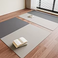 Beige And Gray Square Rugs On Wooden Floor With Book And Slippers