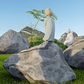 Garden Ornaments Featuring Statue Figures On Large Rocks With Green Grass And Palm Tree
