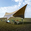 Tan Tensile Membrane Shade Structure For Outdoor Grassland With Picnic Tables And Chairs