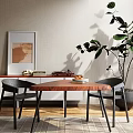 Modern Indoor Table And Chairs With Wooden Top Black Seats Wall Art And Plant