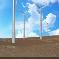 White Wind Turbine Towers Standing In Desert Landscape With Blue Sky And Clouds