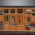 Organized Wooden Closet Interior With Hanging Clothes Storage Boxes And Folded Towels