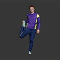 Man Doing Leg Stretch in Purple Active Top and Blue Pants Against Gray Black Background