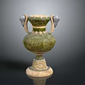 Carved Vase Sculpture with Green Glaze and Animal Head Handles on Beige Base
