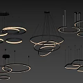 Modern Circular Ring Shaped Metal Pendant Lights Hanging From Ceiling With Warm Lighting Design