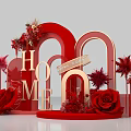 Red Themed Art Installation With Golden HOME Letters Red Arches Roses And Forever Love Ribbon