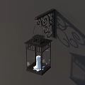 Black Metal Wall Light With Decorative Scroll Design And Glass Shade