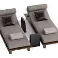 Gray Loungers with Wooden Frames Dark Cushions Folded Towels and Black Side Tables