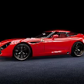 Red Luxury Sports Car With Sleek Aerodynamic Design On Black Background