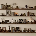 Stylish Decorative Ornament Combination On Wooden Shelves With Vases Frames Books Candles And Lamps