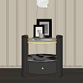 Elegant Modern Bedside Table With Glass Top Drawer And Framed Photos Against Striped Wallpaper