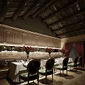 Elegant Private Dining Room With White Tablecloths Wooden Ceiling And Decorative Flowers