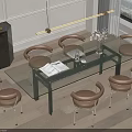 Modern Dining Room Interior With Glass Table Metal Legs And Brown Leather Chairs Hanging Light