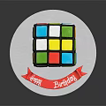 Rubik's Cube Shaped Birthday Cake With Colorful Squares Red Ribbon And Happy Birthday Message