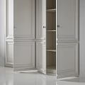 Sleek Modern Wardrobe Interior Design With White Paneled Doors And Metal Handles