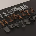 Various Metal Hardware Fittings With Different Finishes Displayed On Dark Surface