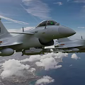 Two Military Fighter Jets Flying In Blue Sky With White Clouds Over Land And Ocean