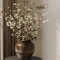 Bonsai Plant With White Small Flowers In Brown Pottery Pot And Indoor Curtain Wall