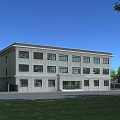 Multi Story Office Building With Gray Exterior Large Windows And Green Lawn