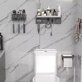 Elegant Bathroom Toilet With Marble Wall Toilet Paper Holder And Dark Wood Vanity Cabinet