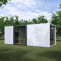 Modern White Container Style Guesthouse Building With Glass Windows And Green Trees