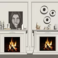 White Fireplaces With Burning Flames And Decorative Items Including Portrait And Circular Wall Art