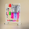 White Clothing Rack Display With Colorful Hanging Clothes And Shoes