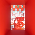 Popular Photo Spot With Red 65 Sculpture Surrounded By Red Wall And Display Frames