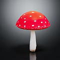 Shiny Red Mushroom with White Spots on Cap and White Stem Isolated on Black Background